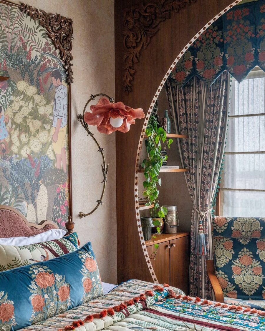 Charming floral motifs enliven this cozy bedroom