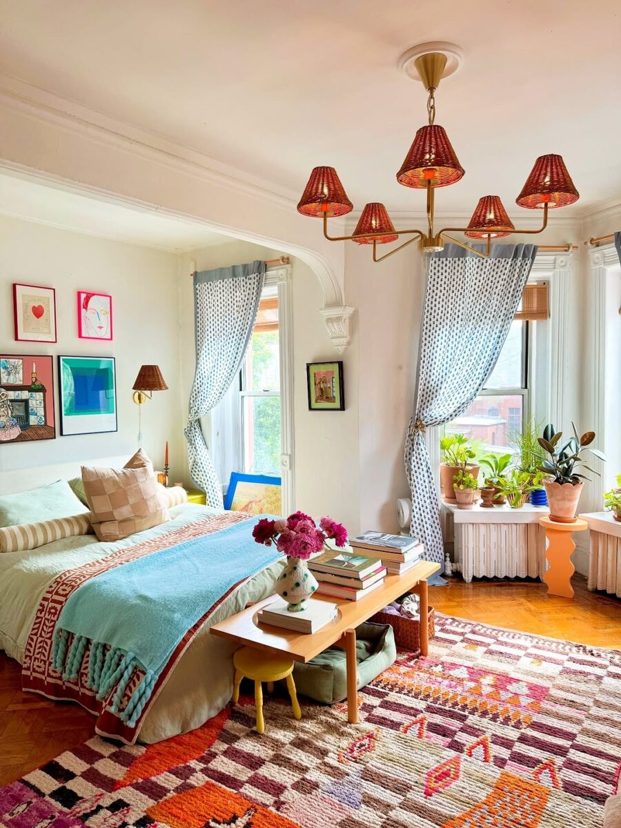 Vibrant floral accents enhance a cozy bedroom