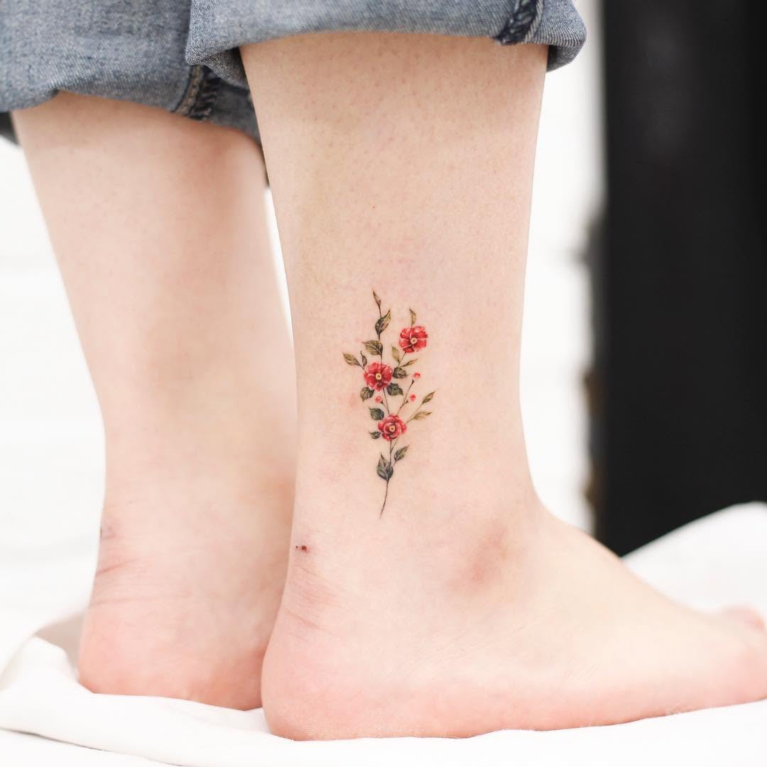 Charming floral design for ankle tattoos