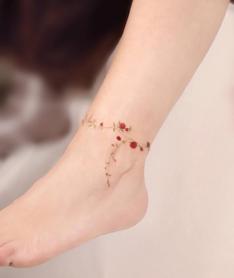 Delicate flower ankle tattoo with elegant roses