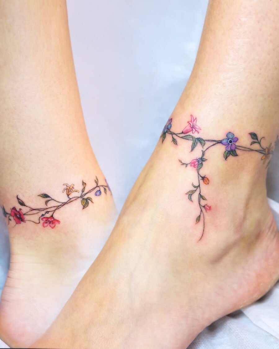 Delicate floral vines gracefully wrap around ankle
