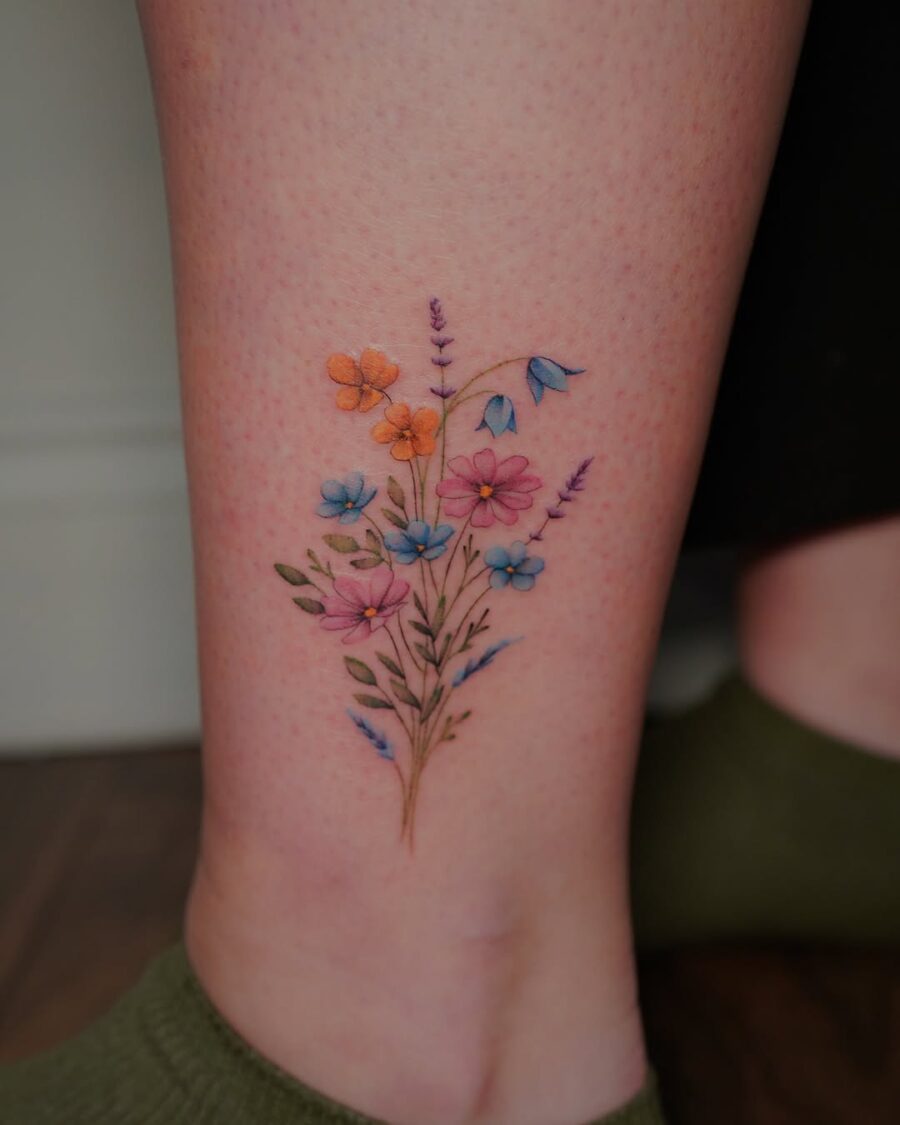 Whimsical floral ankle tattoo design
