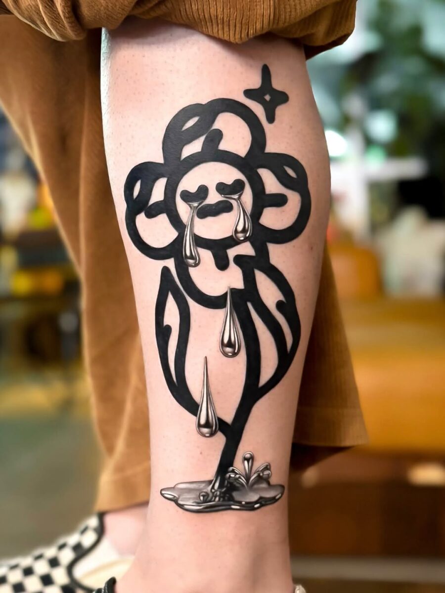 Emotional silver ink flower tattoo design
