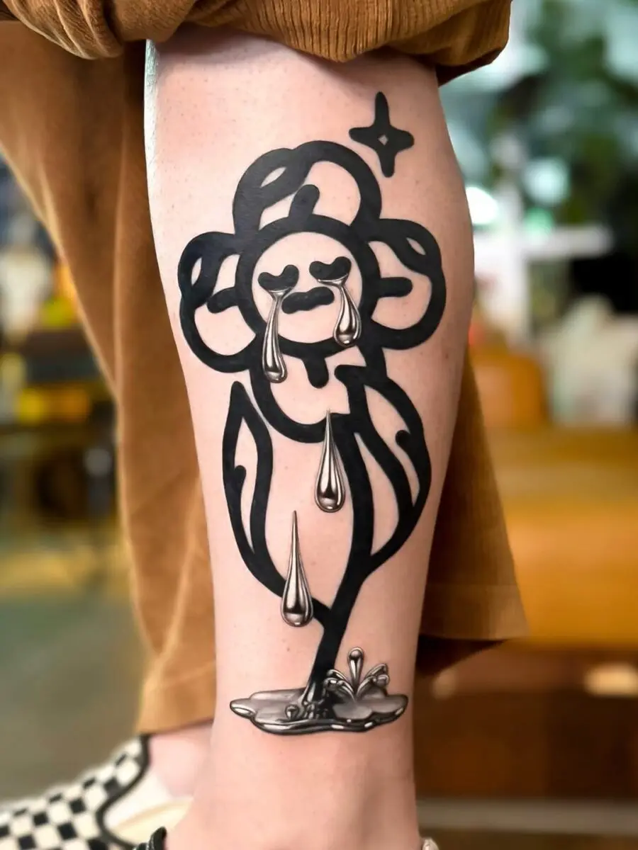 Emotional silver ink flower tattoo design