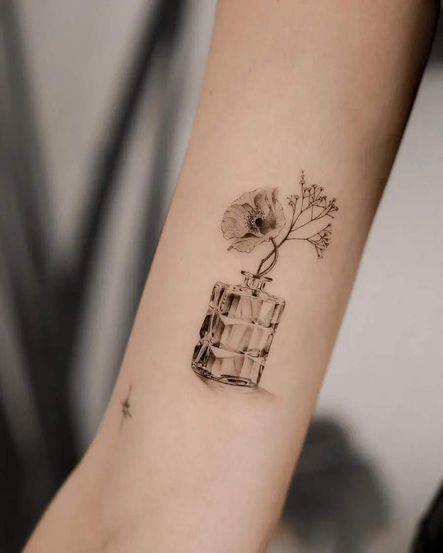 Elegant flower vase tattoo showcasing delicate beauty