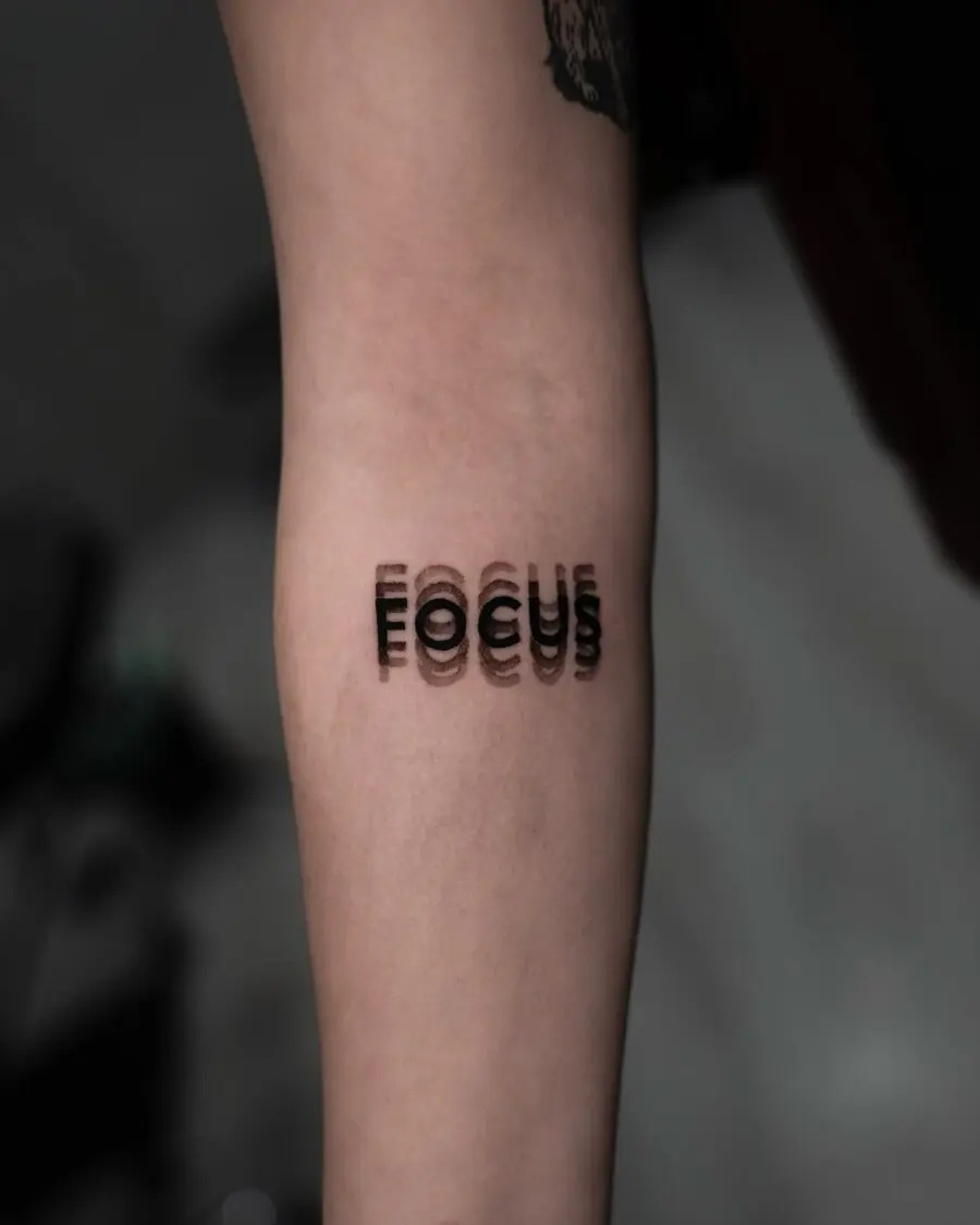 Stylish and modern focus tattoo design
