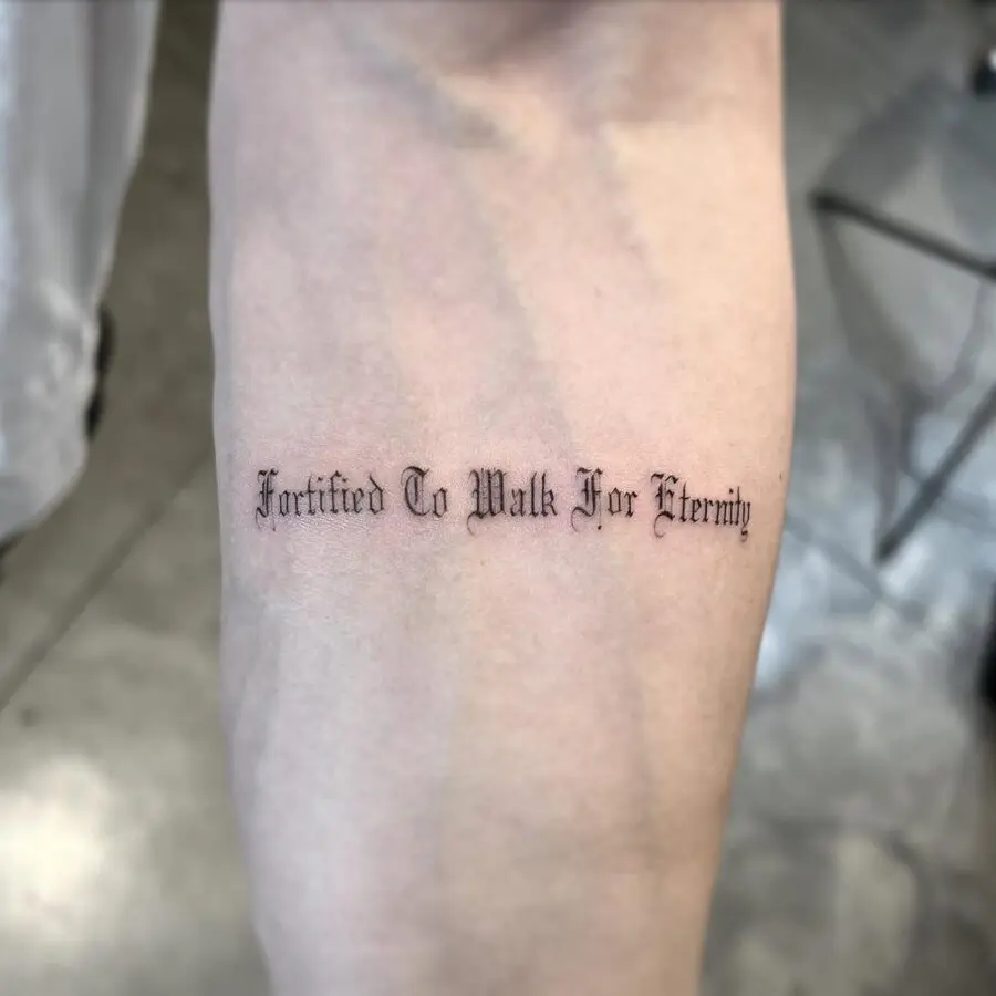 Elegant script tattoo with a profound message