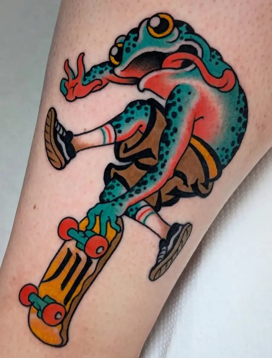 Vibrant skateboarding frog tattoo design