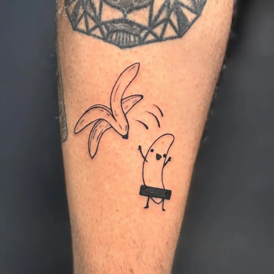 Whimsical banana tattoo brings smiles.