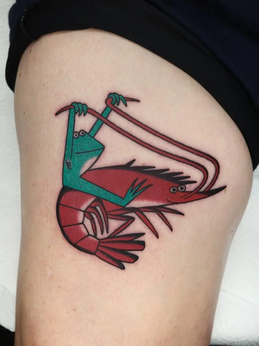 Playful shrimp tattoo showcasing vibrant colors