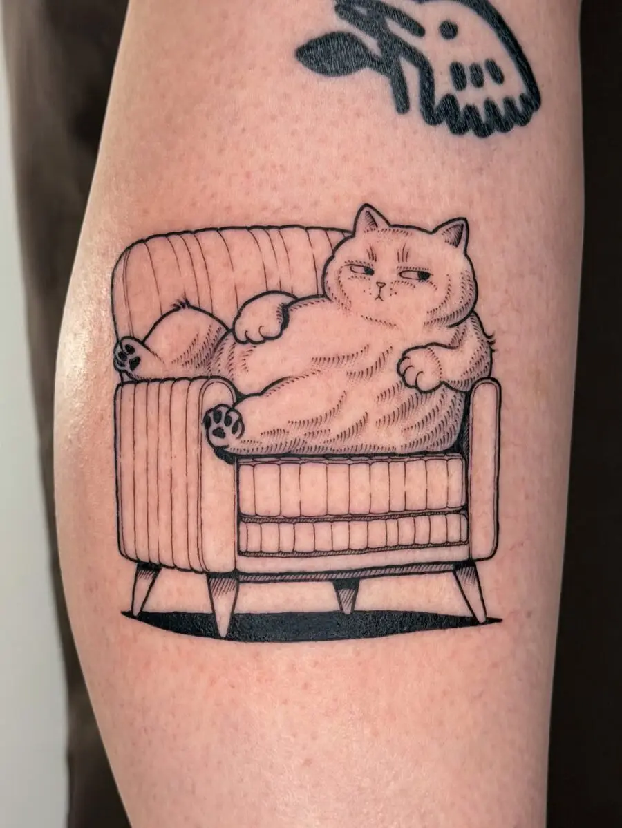Chill Cat Lounging on a Couch Design