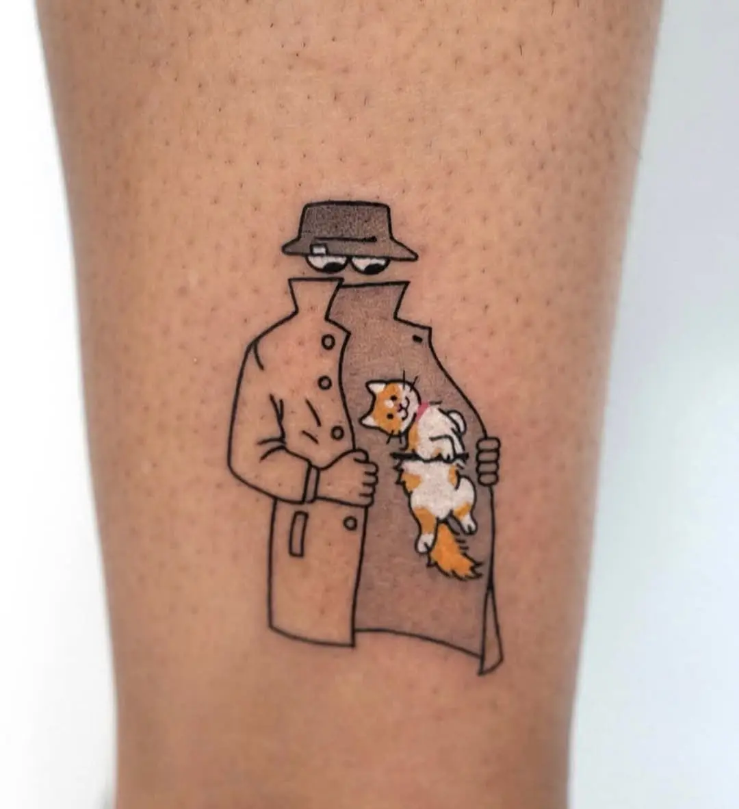 Hilarious tattoo of a sneaky figure.