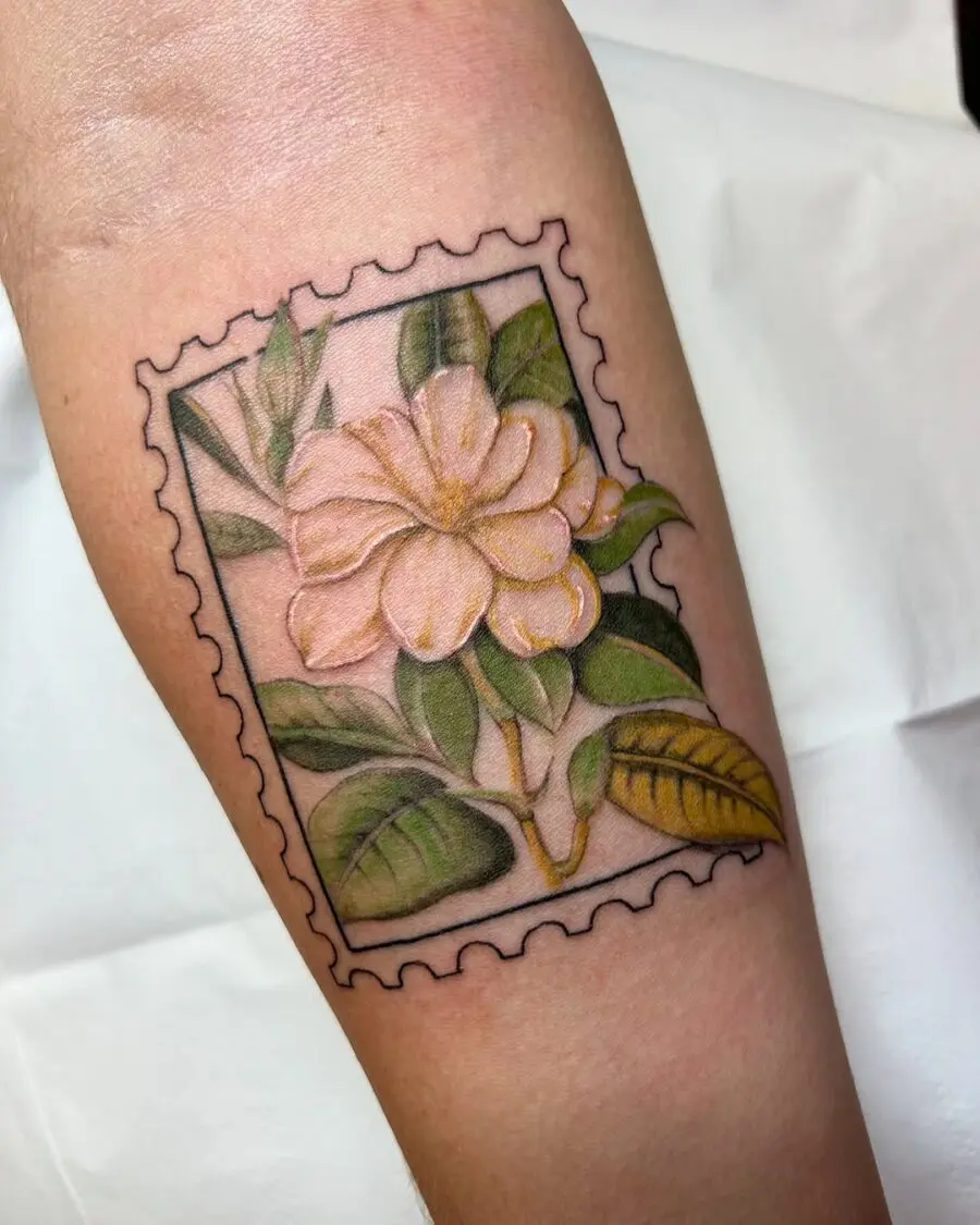 Unique gardenia tattoo with a framed design