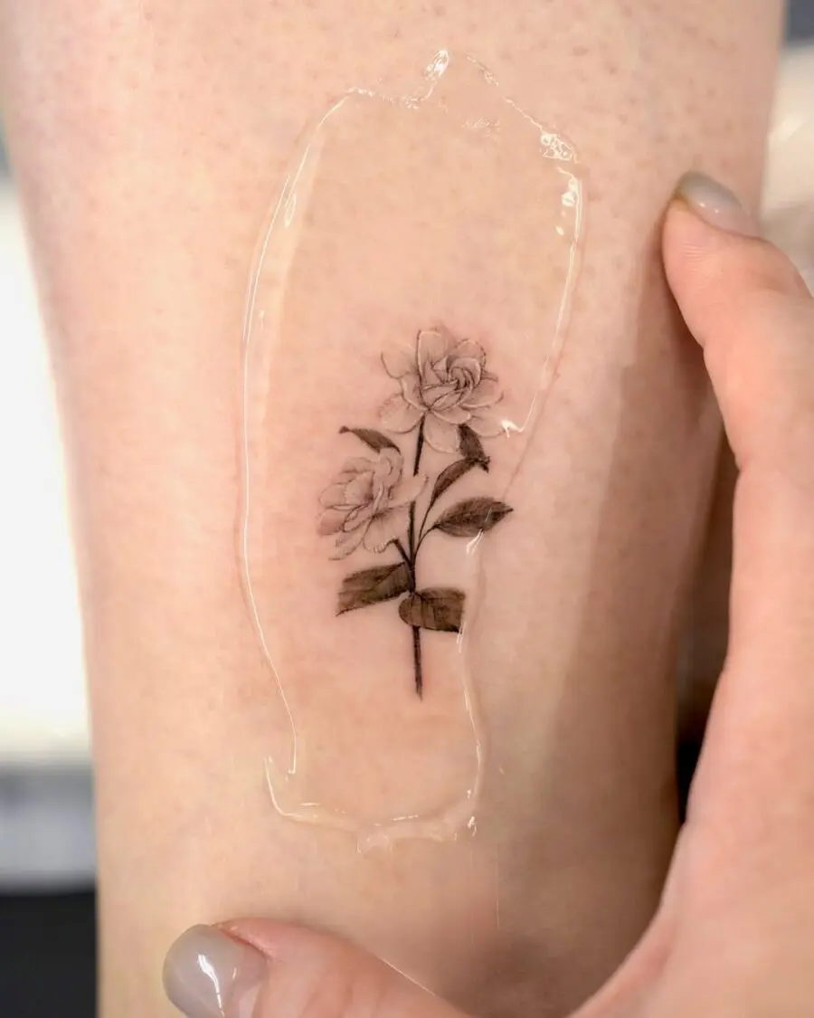Delicate gardenia tattoo with natural tone