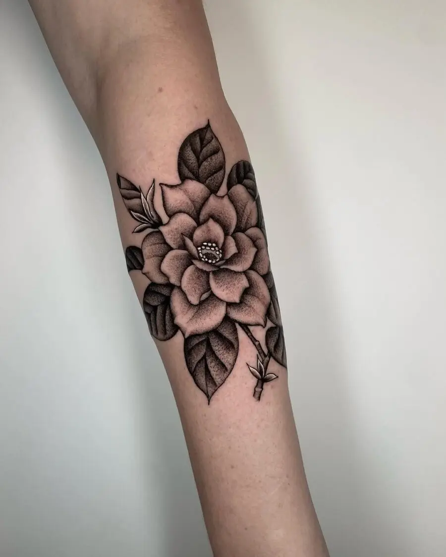 Elegant gardenia tattoo with intricate leaf details