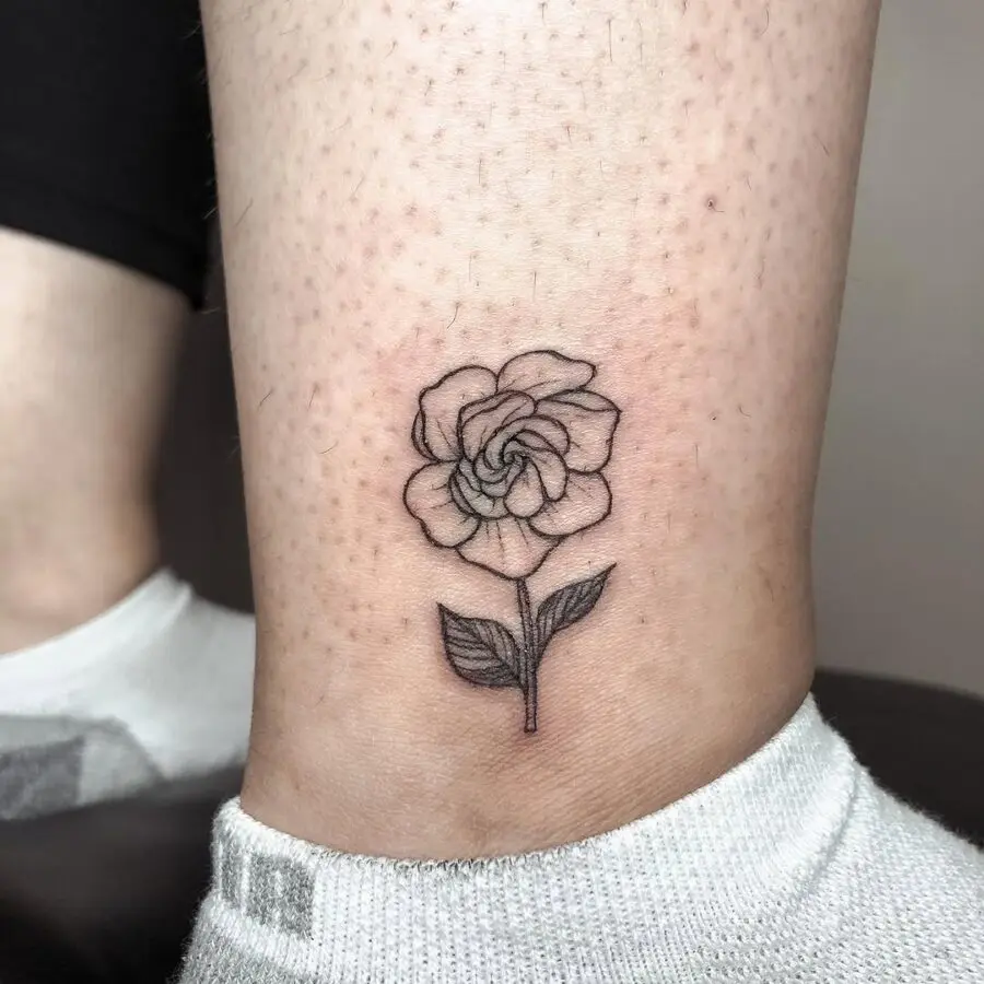 Elegant gardenia tattoo on ankle