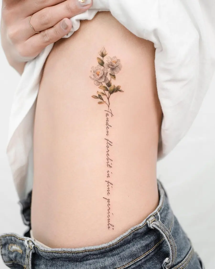 Beautiful gardenia tattoo blending art and text