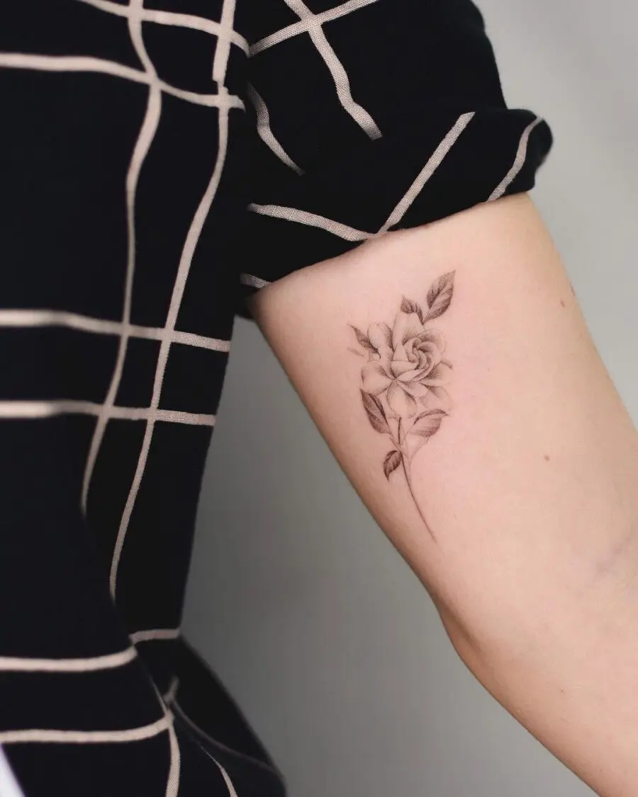 Elegant gardenia tattoo with delicate shading