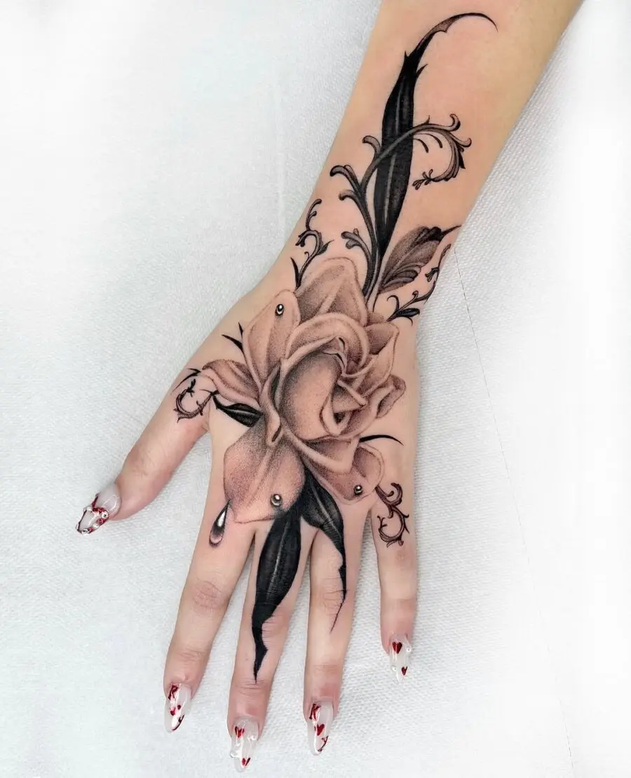 Elegant gardenia hand tattoo showcasing artistic flair