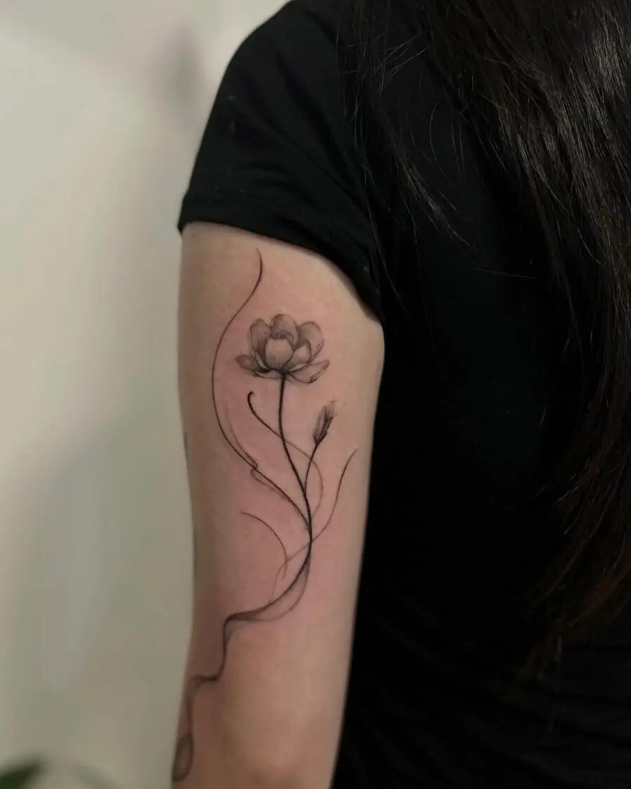Delicate gardenia tattoo gracing the arm