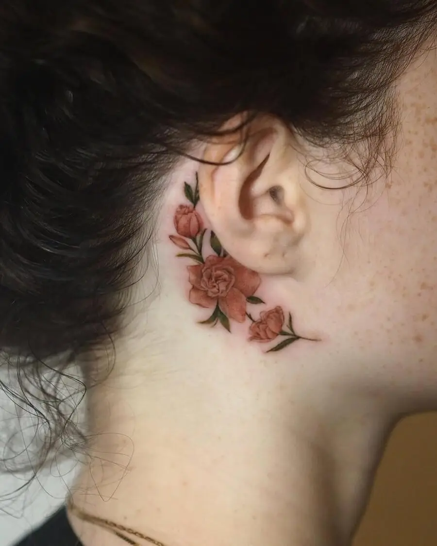 Elegant gardenia tattoo peacefully adorns the neck.