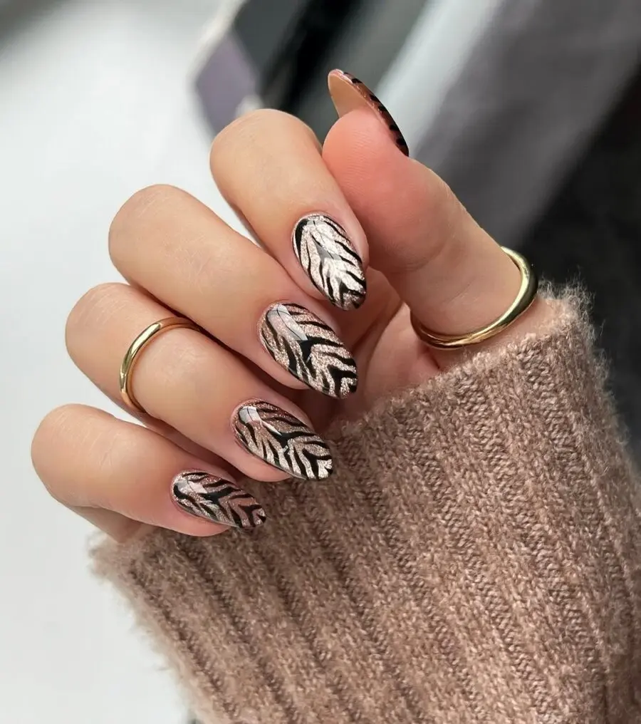 Chic animal print nails with a stylish twist