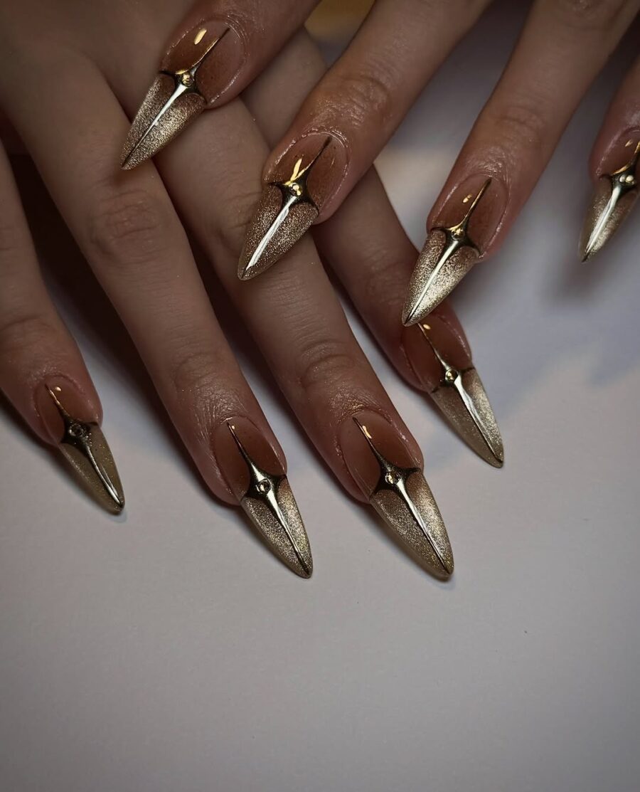 Chic stiletto nails with golden accents