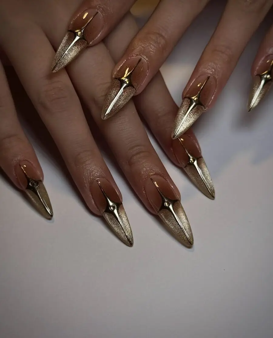 Chic stiletto nails with golden accents