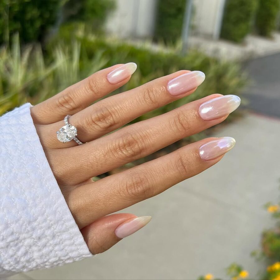 Elegant glazed donut nail design with shine