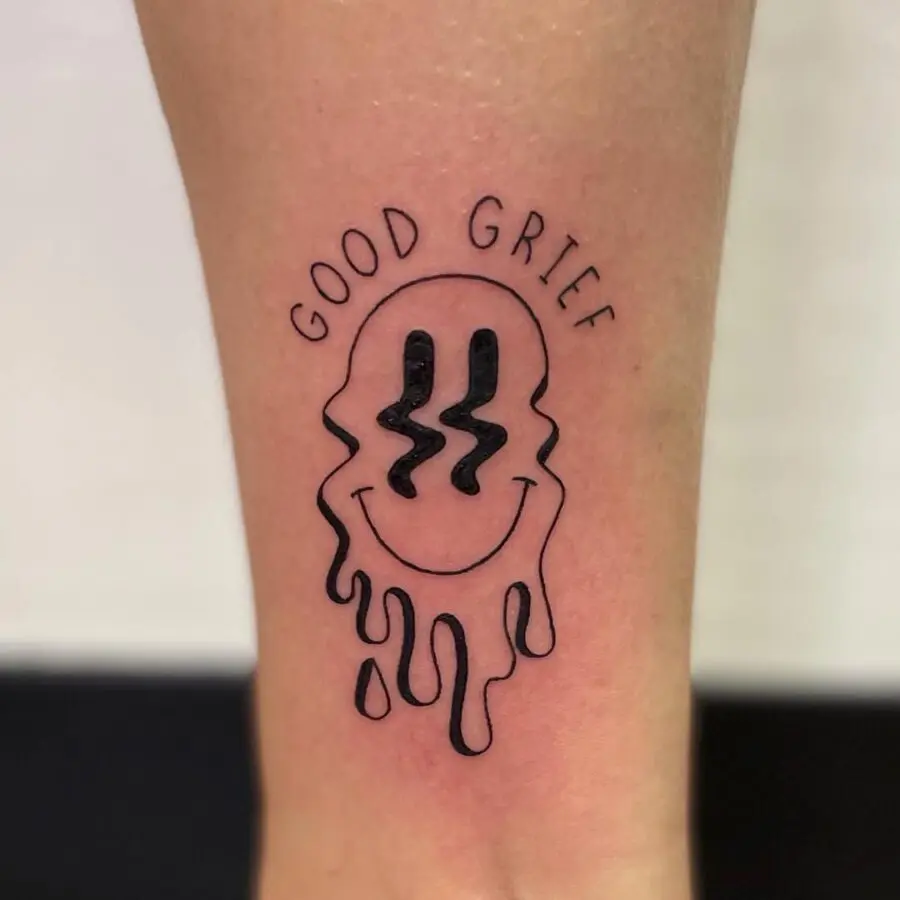 Melting smiley face tattoo with a twist