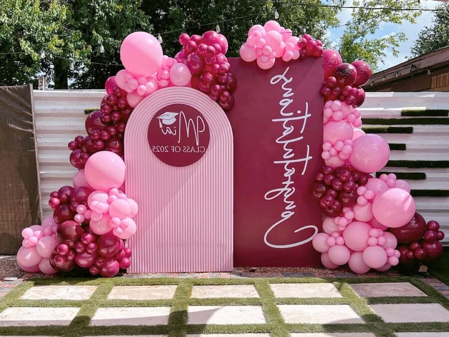 Elegant pink balloon archway for graduation parties