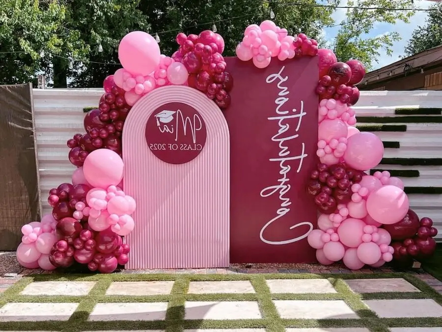 Elegant pink balloon archway for graduation parties