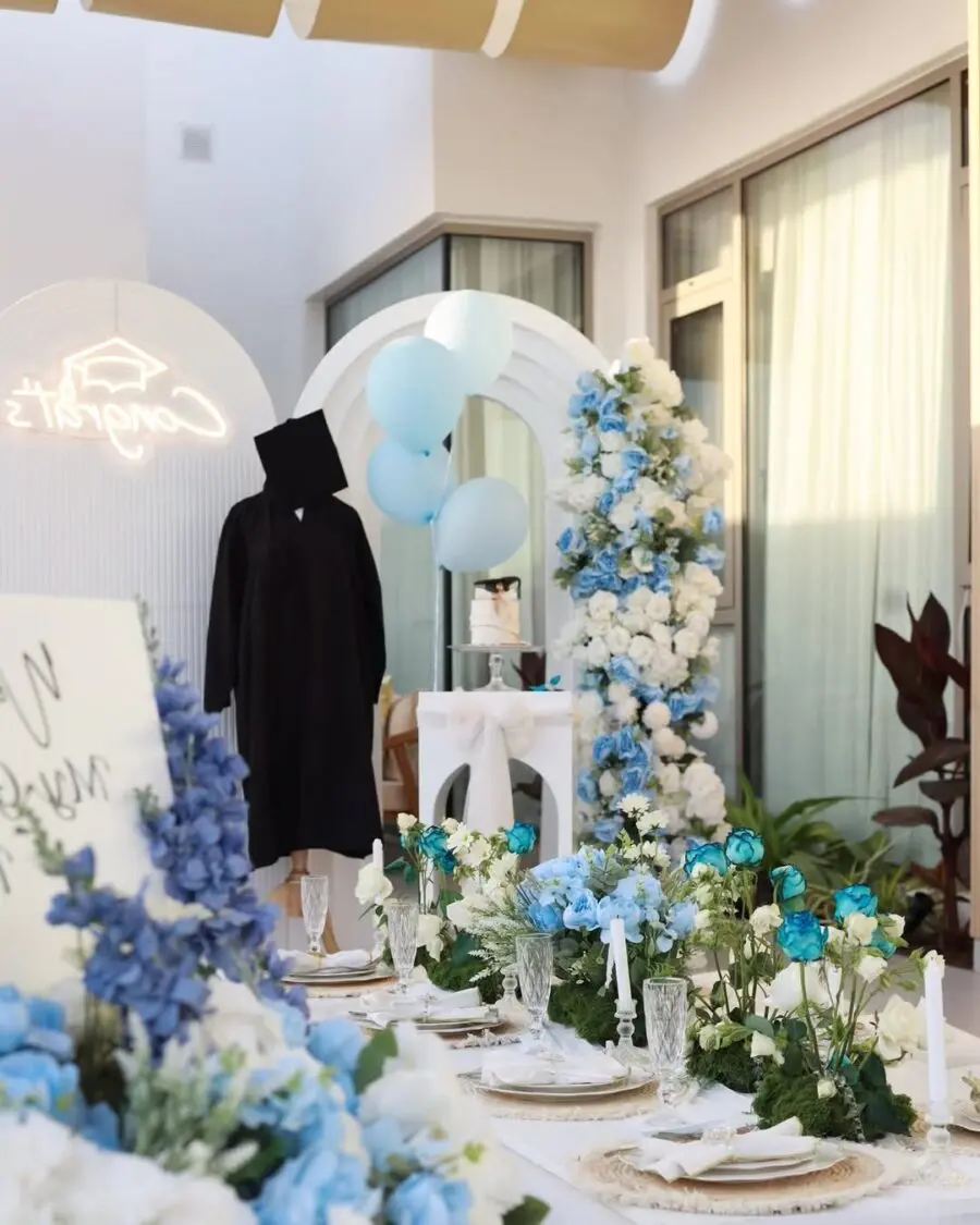 Elegant blue and white floral graduation setup