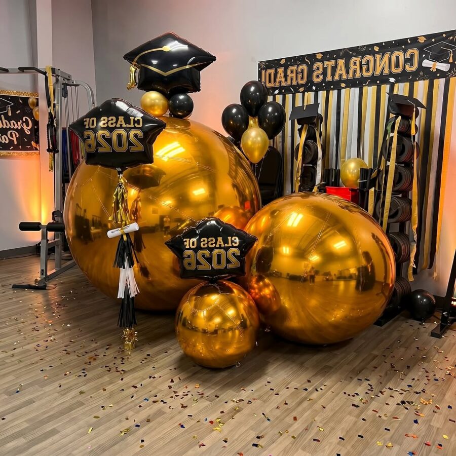 Elegant gold and black graduation balloon display