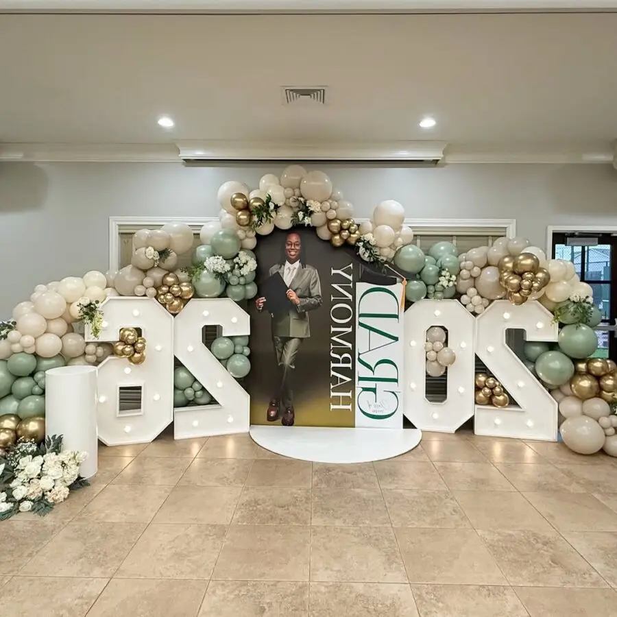 Elegant balloon backdrop for a graduation celebration