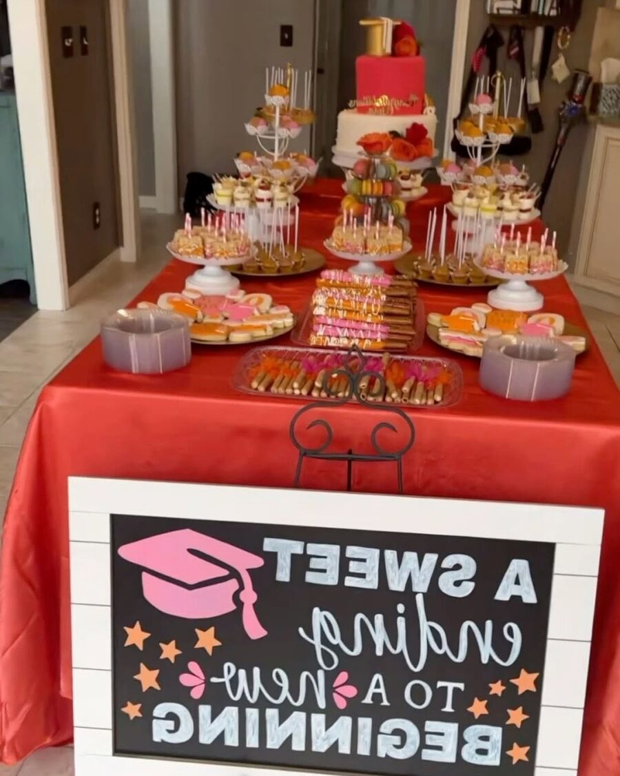 Vibrant festive graduation party dessert table