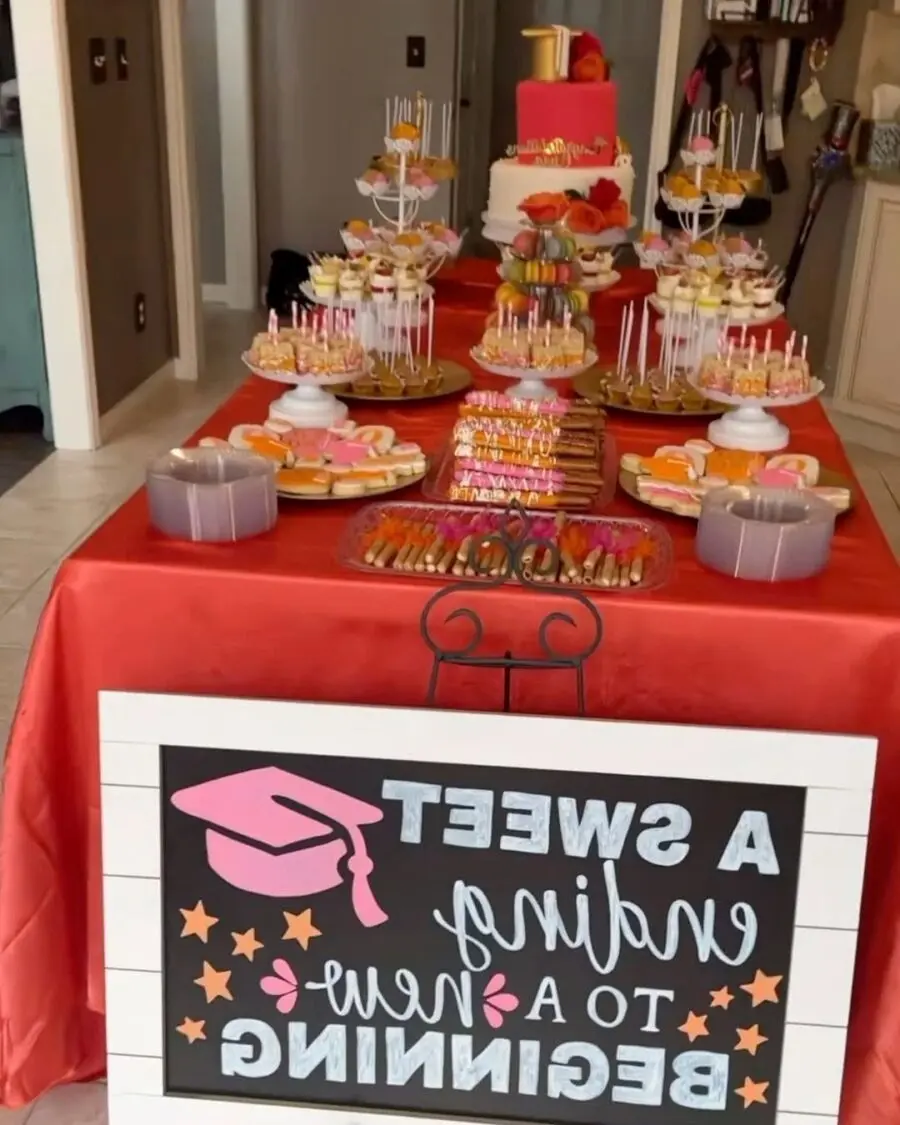 Vibrant festive graduation party dessert table