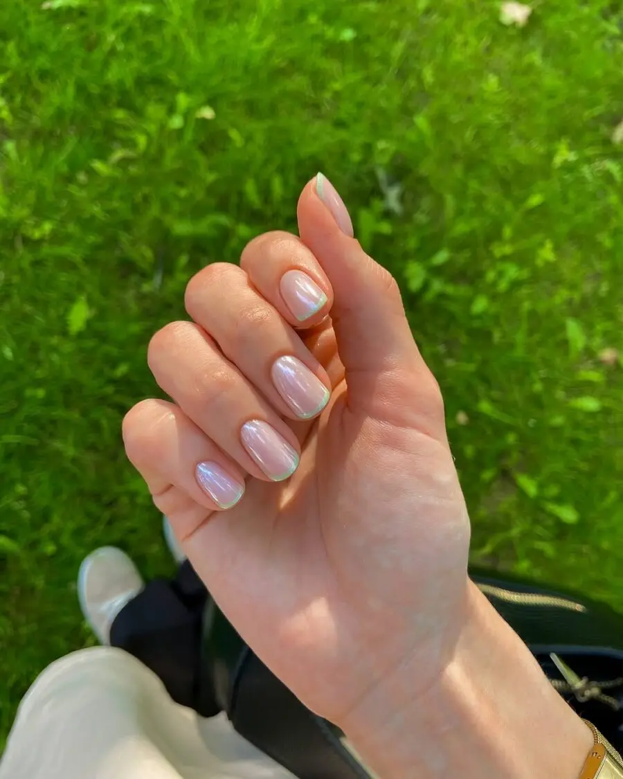 Chic green french tips with a glossy finish