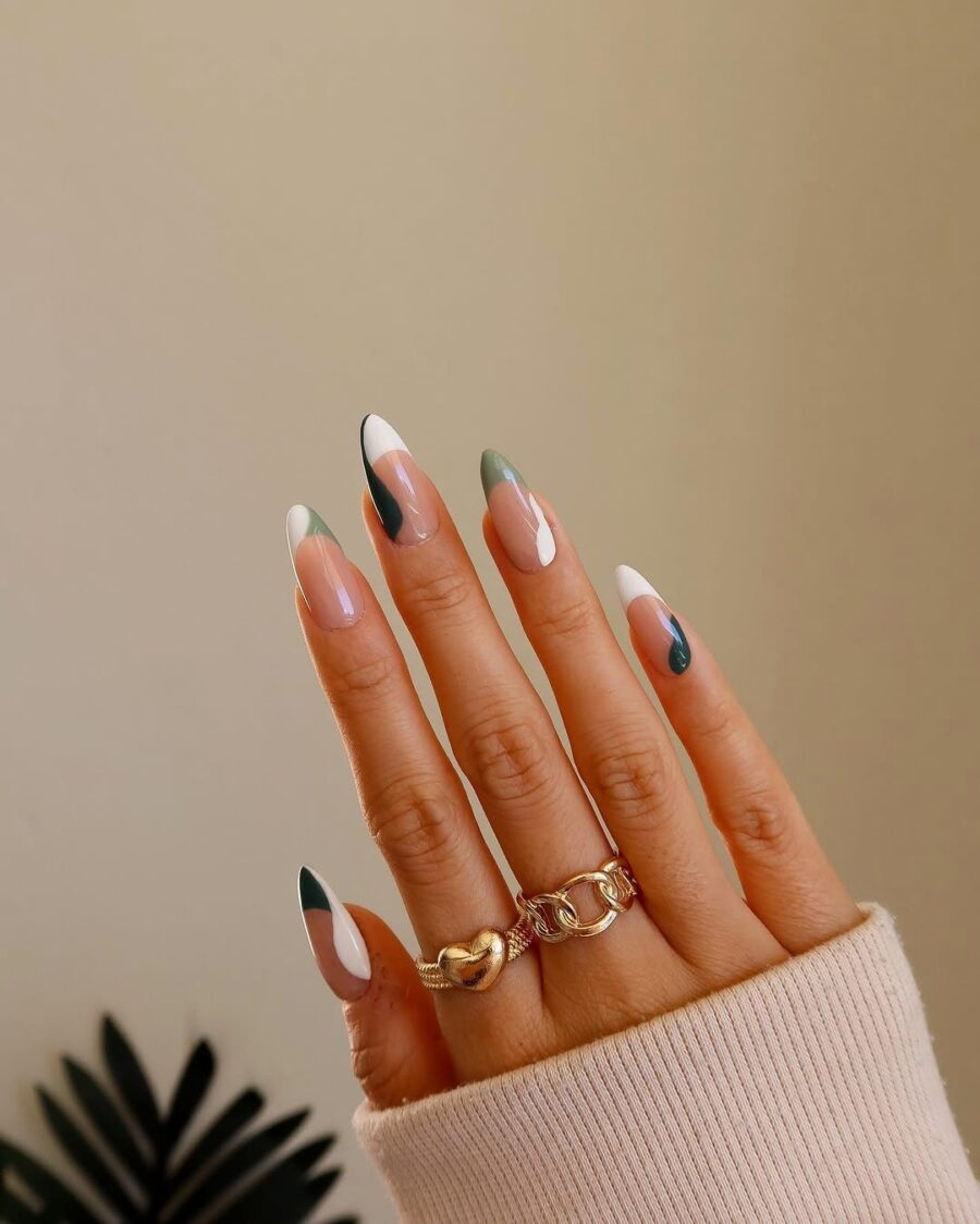 Chic green French tip nail design with flair