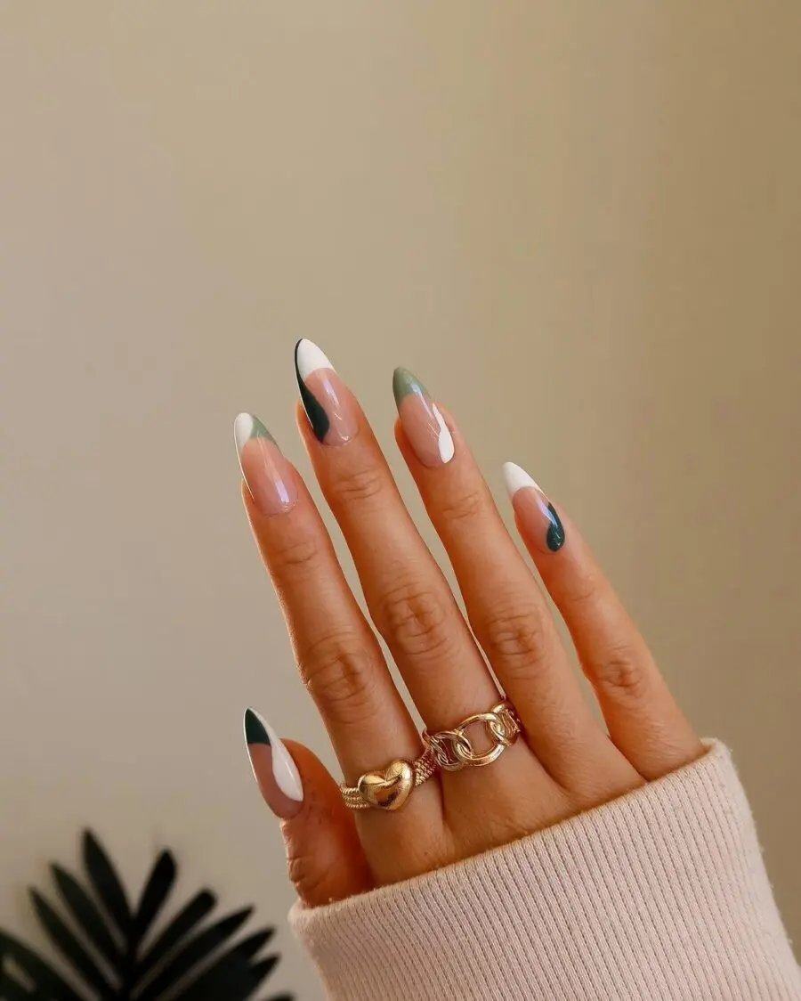 Chic green French tip nail design with flair