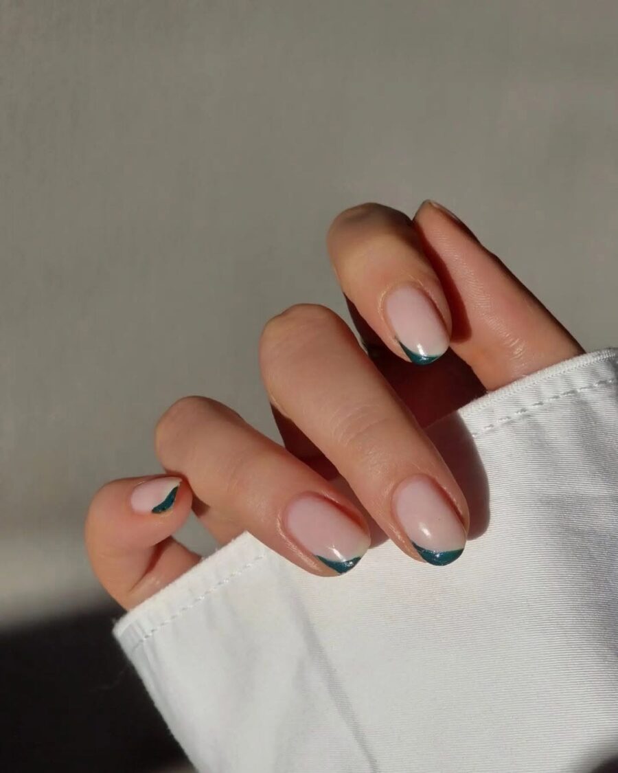 Stylish green French tip nail design