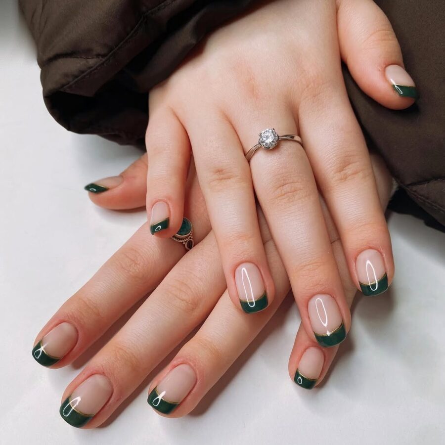 Elegant and trendy green French tip nails