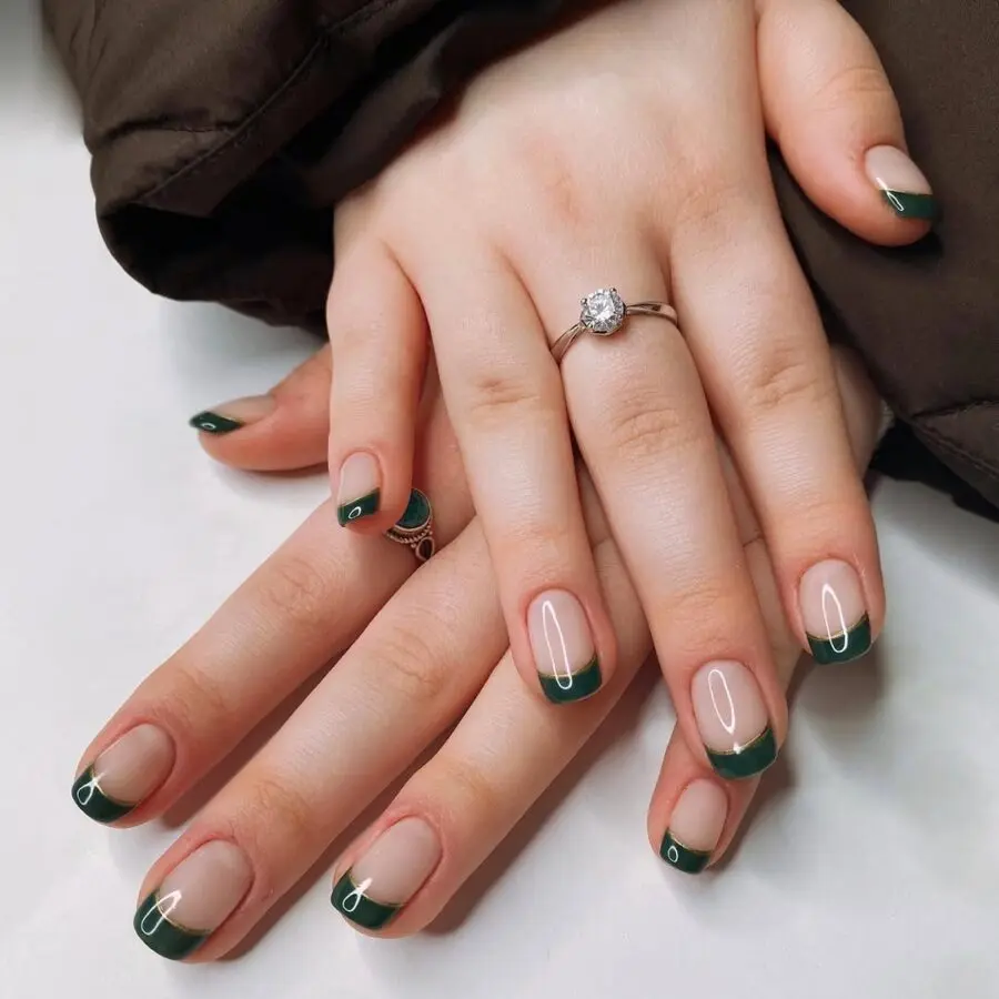 Elegant and trendy green French tip nails