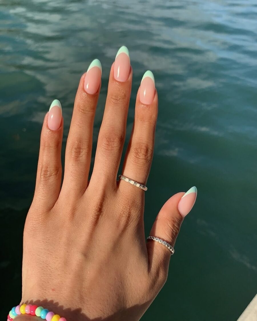Chic green French tip manicure for summer