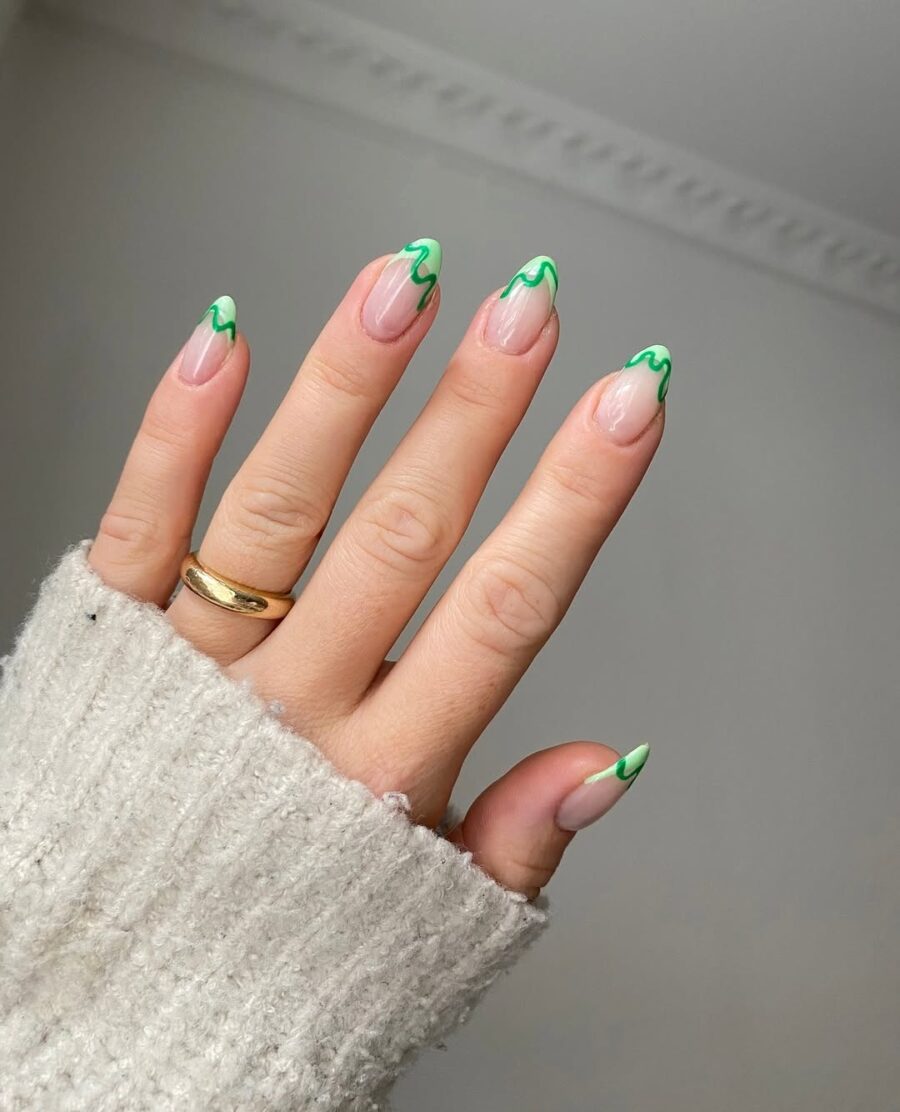 Chic green french tip with playful designs