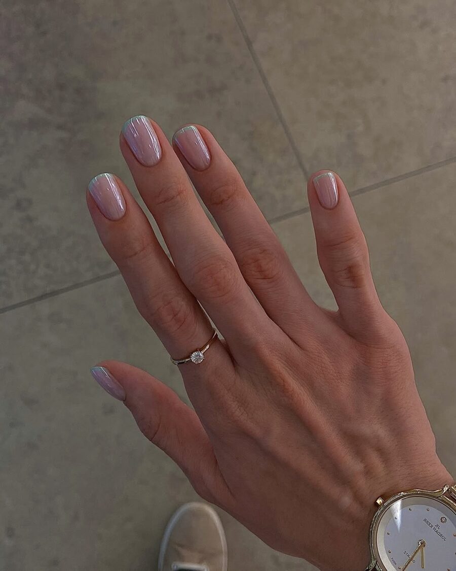 Stylish green French tips with a chic twist