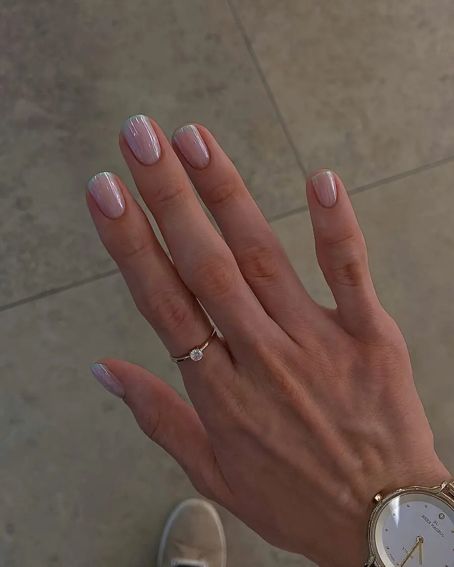 Stylish green French tips with a chic twist