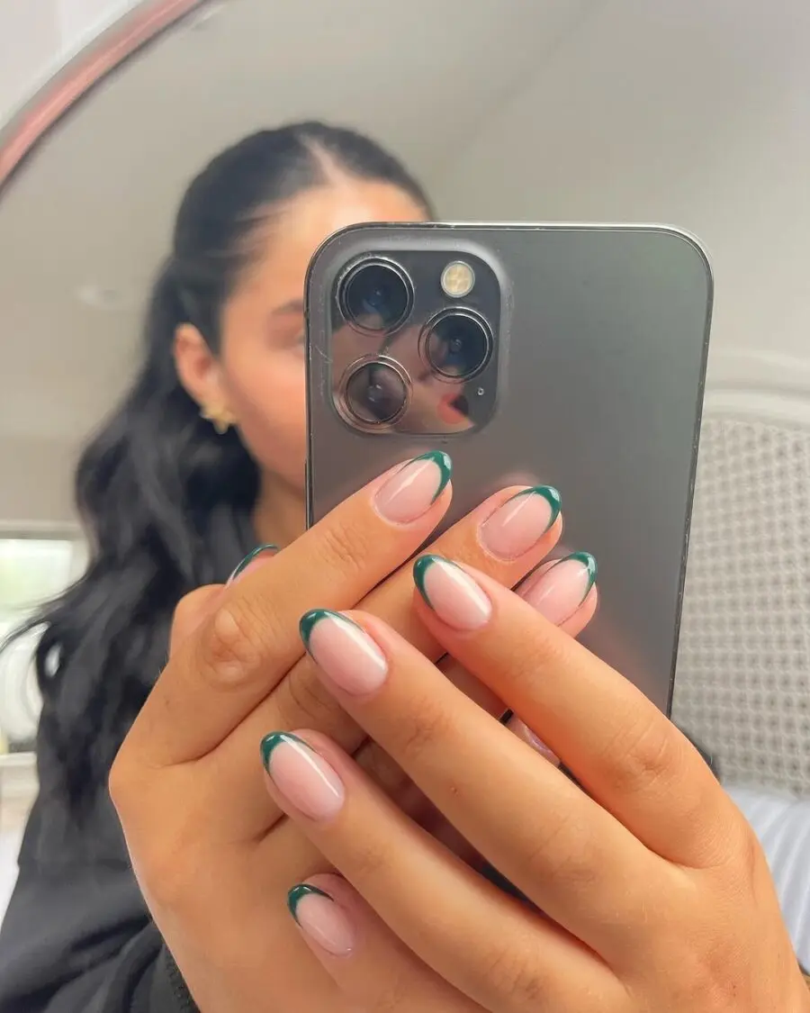 Trendy Green French Tip Nail Design Displayed