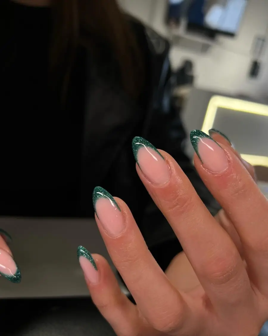 Chic and vibrant green French tip nails