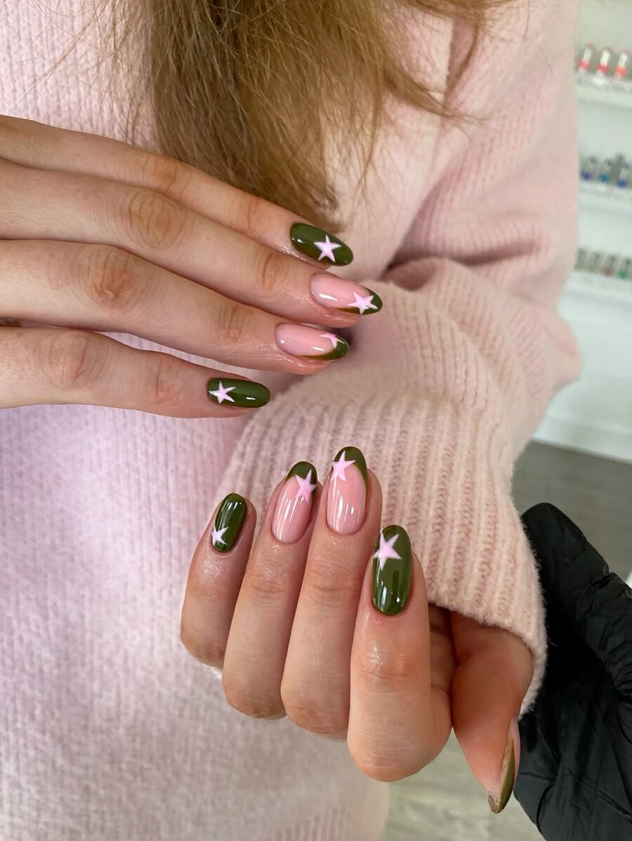 Chic green and pink nails with star accents